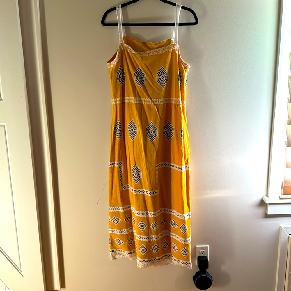 Women's yellow bohemian summer maxi dress.